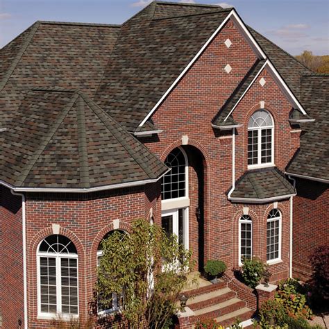 brick house with brown roof